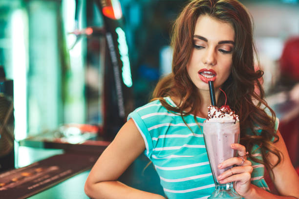 istock She makes sipping milkshake look sexy 937322788