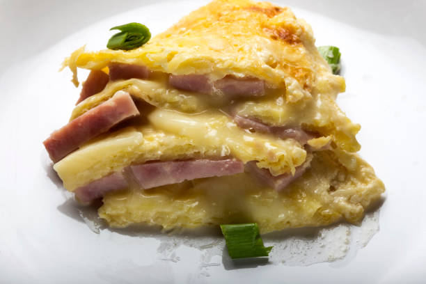 istock Close up of baked cake made from ham, eggs, cheese and sour cream 937337796