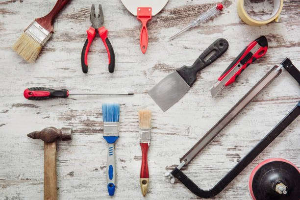 istock Tools for repairing on grey wooden background 937346850