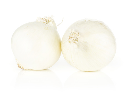 White onion two shiny and fresh pearls isolated on white background