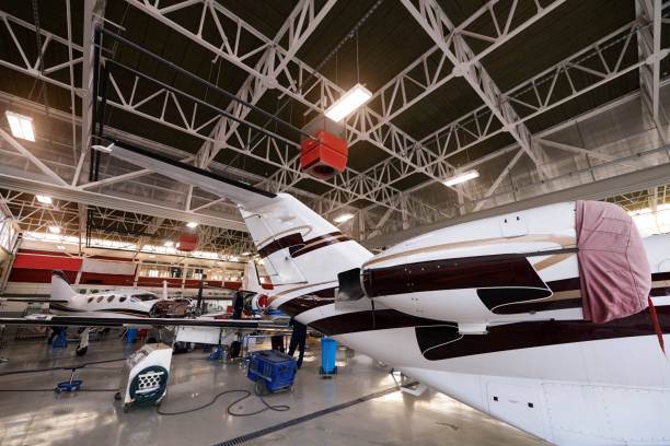 istock Aircraft mechanic in the hangar 937359560