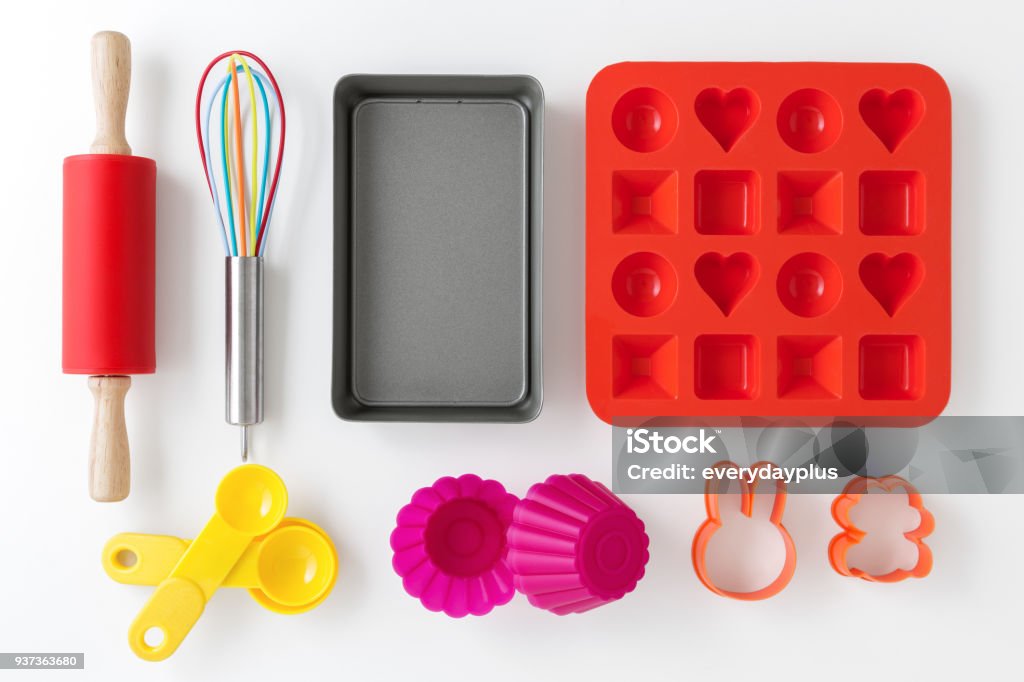 Baking and kitchen utensils Baking and kitchen utensils and tools on white table background Molding a Shape Stock Photo