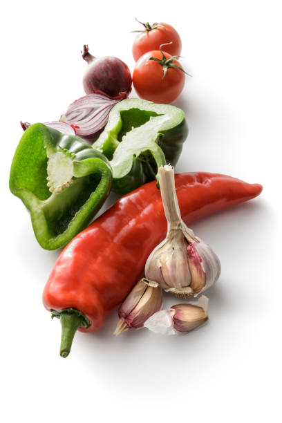 Vegetables: Peppers, Garlic, Onion and Tomatoes Isolated on White Background