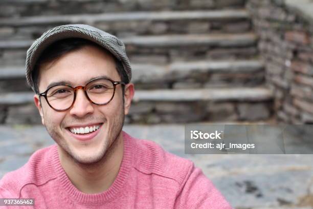 Hip Man Smiling Wearing Eyeglasses And Hat Stock Photo - Download Image Now - Men, People, Males