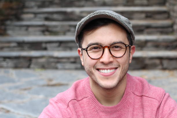 istock Hip man smiling wearing eyeglasses and hat 937366814