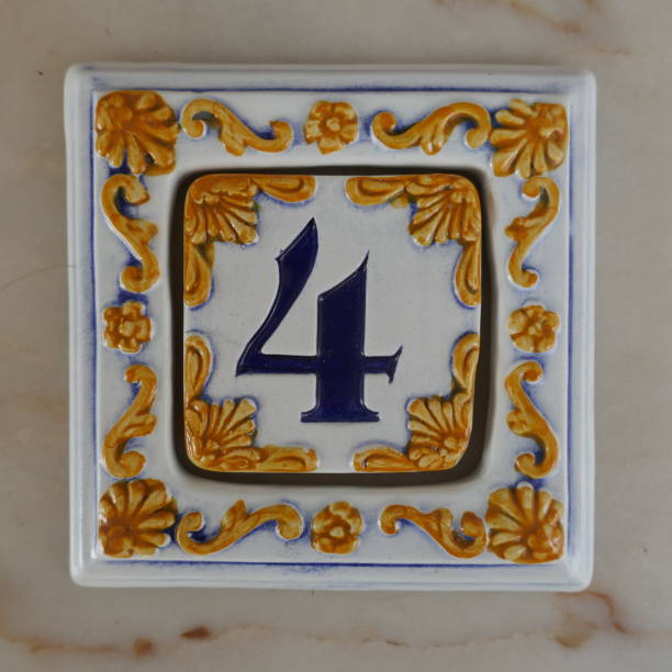 Number 4, portuguese or spanish ceramic tiles, azulejos, with digits for house- or room number signs Portuguese ceramic tiles, Azulejos, with digits for house- or room number signs. ceramic tile house numbers stock pictures, royalty-free photos & images