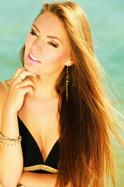 istock Beautiful Woman at the Beach 937371686