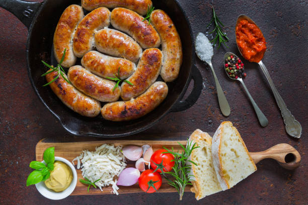 istock Sausage in Frying Pan 937384138