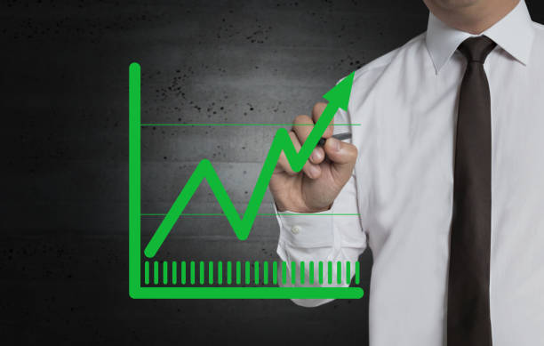 istock Chart is written by businessman on screen 937387526