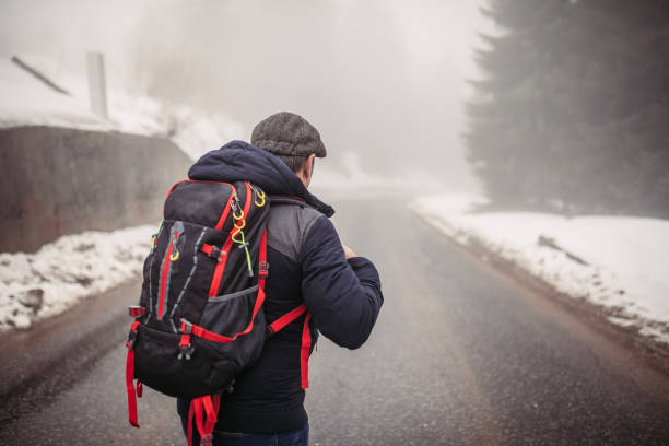 istock Senior man trail hiking 937387616