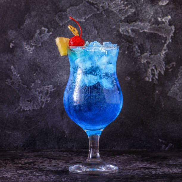 istock Blue Curacao cocktail decorated with fruit 937387794