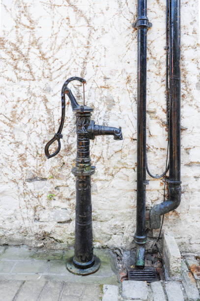 istock Ancient Water Column At Old Town street 937387912