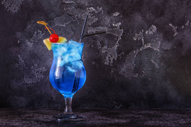 istock Blue Curacao cocktail decorated with fruit 937388058