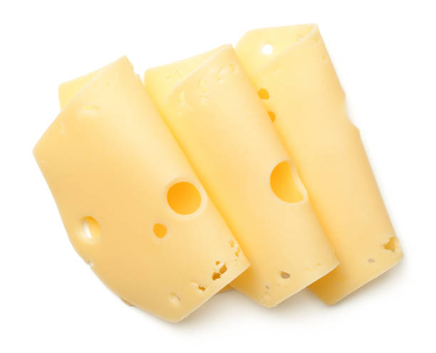 lonchas de queso aislados sobre fondo blanco - cheese fotografías e imágenes de stock
