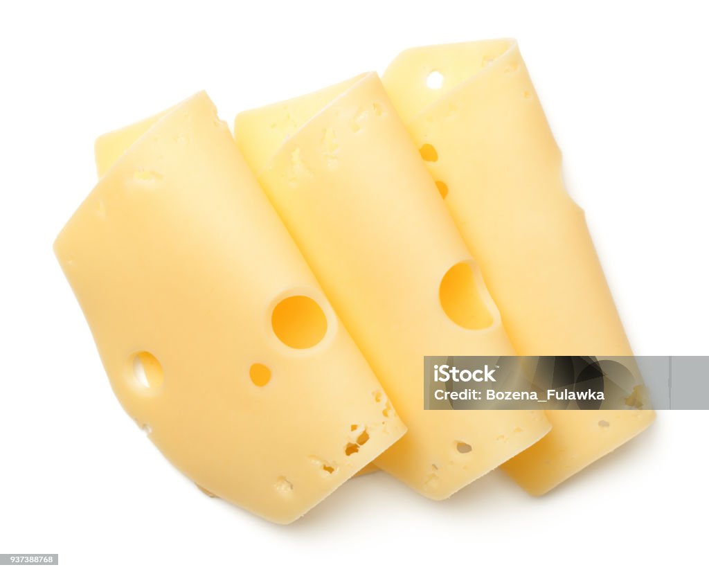 Fette di formaggio isolate su sfondo bianco - Foto stock royalty-free di Formaggio