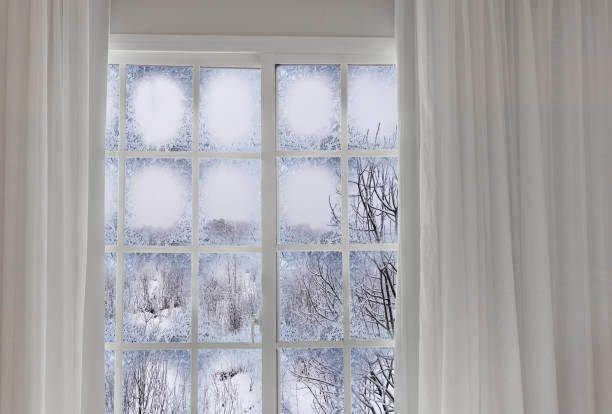 istock view through a frozen landscape window 937402946