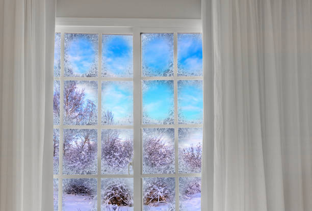 istock view through a frozen landscape window 937403360