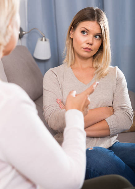 istock mother scolds her adult daughter 937407094