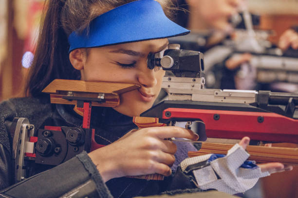 istock Two women with a machine guns 937407276
