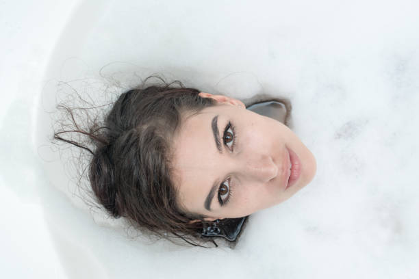 istock Relaxing in a huge bath tub, what a luxury lifestyle 937407964