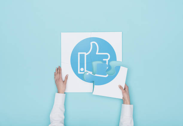 istock Woman completing a puzzle with thumbs up icon 937410738