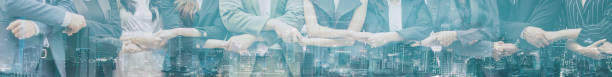 istock Young business team together holding hands 937411854