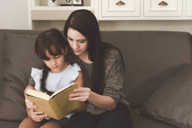 istock I am reading you a story 937411884
