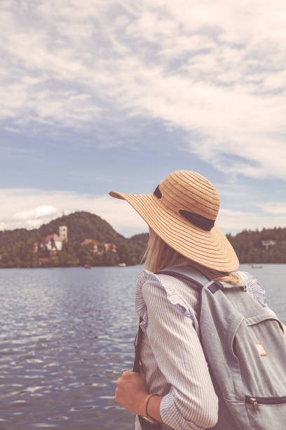 istock Pretty girl posing on a lake shore. 937412740