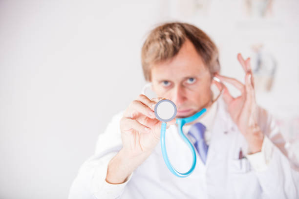 Professional doctor auscultating with sthethoscope. Image taken with Canon 5Ds an EF 70-200mm 2,8 USM L.
