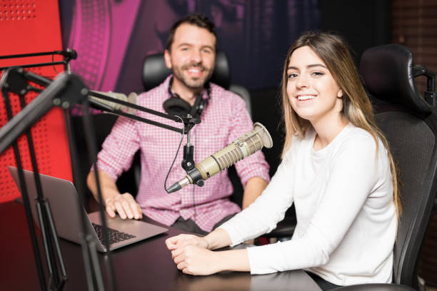 istock Radio presenters hosting at live talk show 937430882