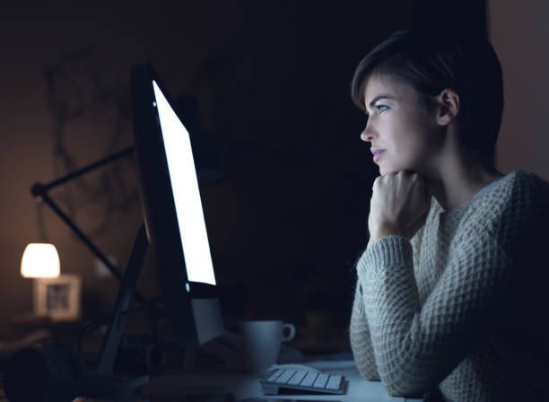 istock Woman connecting at night 937439348