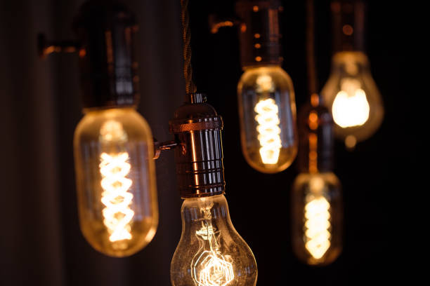 istock Incandescent spiral retro vintage warm lamp edison 937439674
