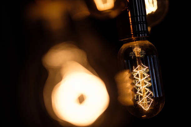 istock Incandescent spiral retro vintage warm lamp edison 937439826