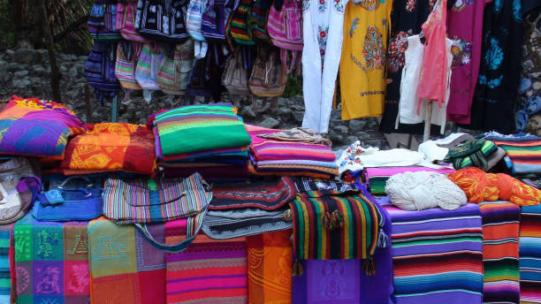 mexican traditional clothing market stall scene in yucatan. mexico - mexico dress market clothing imagens e fotografias de stock