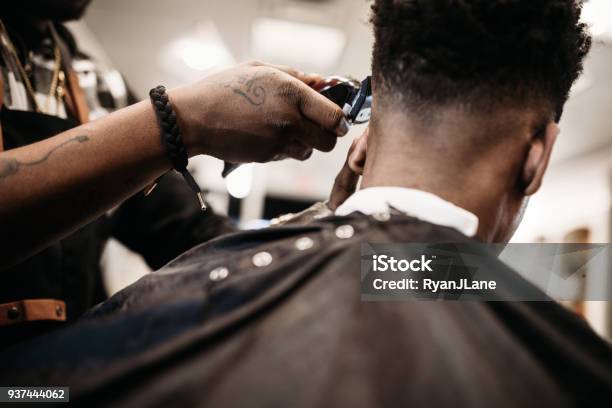 Barber Giving A Haircut In His Shop Stock Photo - Download Image Now - Barber Shop, Barber, Men