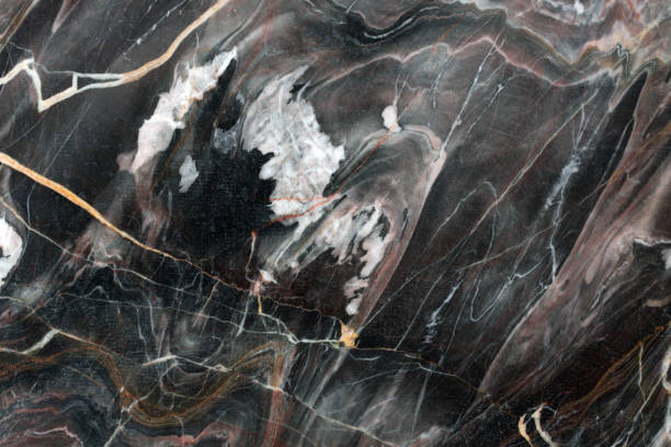 Dark marble patterned texture background Dark marble patterned texture background. High resolution photo. metamorphic rock stock pictures, royalty-free photos & images