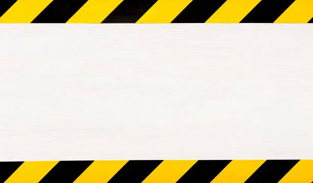 Photo of Under construction concept background. Warning tape.