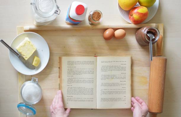 istock baking yeast cake with cocoa filling - weighing flour 937450986