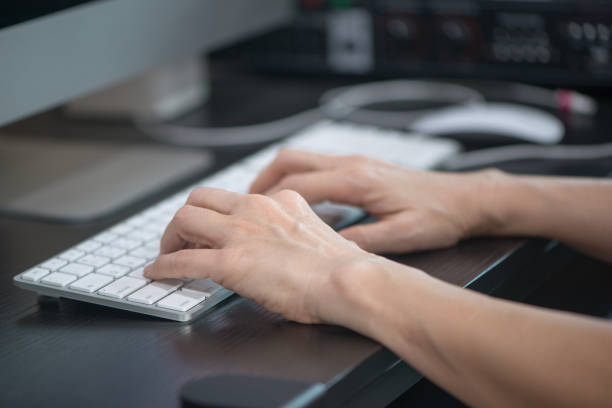 istock Woman's hand on type desktop keyboard, working at home office 937451568