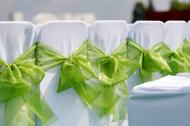 Wedding interior with row of white chairs