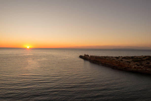 istock Sunrise at the Cala Sa Punta in Ibiza 937463214