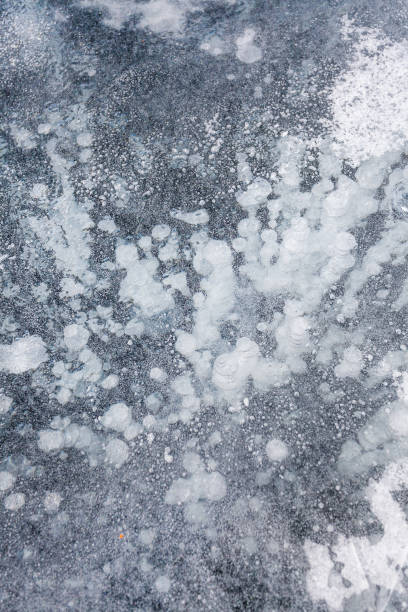 istock ice texture with frozen air bubbles 937463808