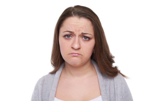 istock sad woman looking at camera 937463888