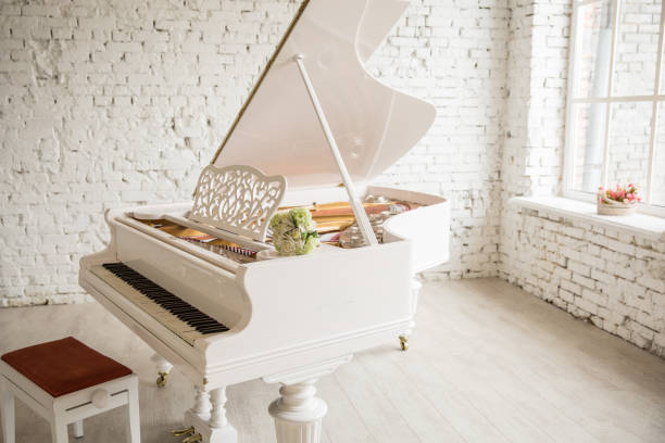 istock white grand piano standing in elegant white interior 937466148