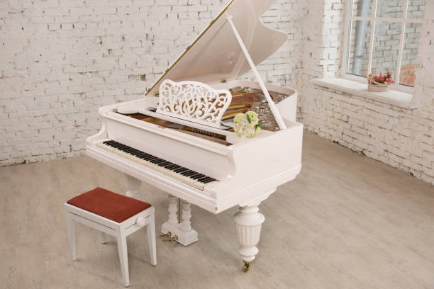 istock white grand piano standing in elegant white interior 937466272