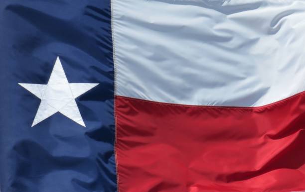 Texas state flag close-up, background Texas state flag close-up, background Christine Kohler stock pictures, royalty-free photos & images