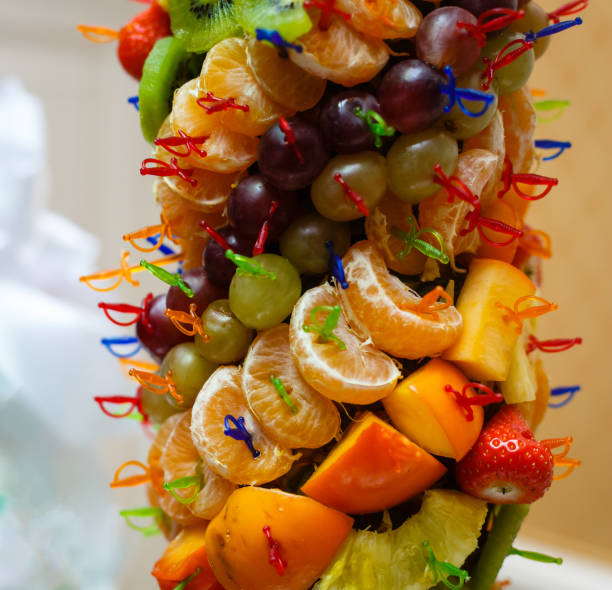istock berries and fruit on skewers on a buffet table 937476224