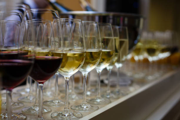 istock rows of wine glasses with red and white wine on a buffet table 937482938