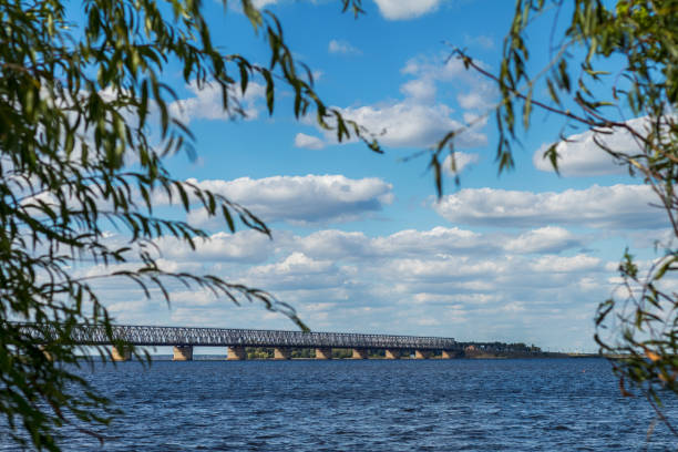 istock Colorful spring landscape on river with beautiful clouds in the sky 937488506