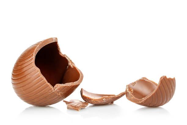 broken chocolate egg stock photo